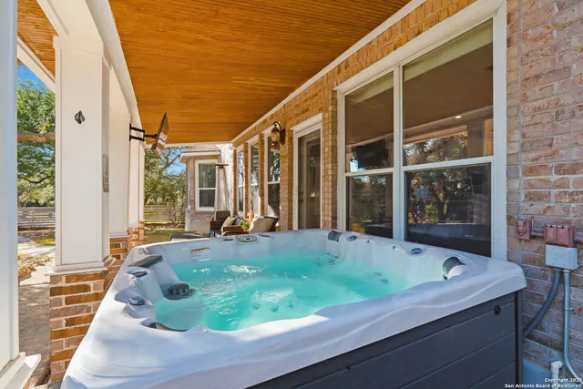 a bath tub sitting in front of a window