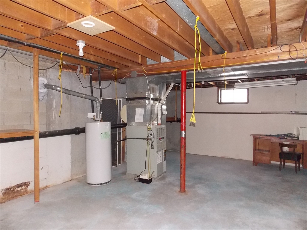 26 Old Bolton Road Hudson, MA 01749 - Photo 14 of 19 a view of a storage & utility room