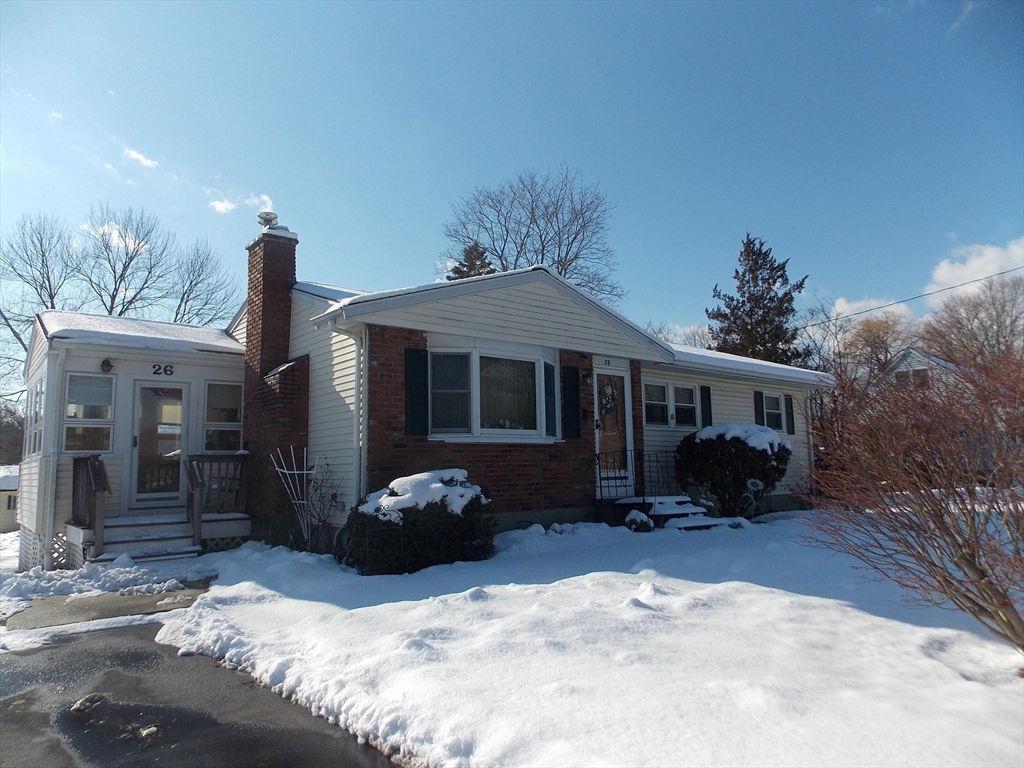 26 Old Bolton Road Hudson, MA 01749 - Photo 16 of 19 a front view of a house with a yard