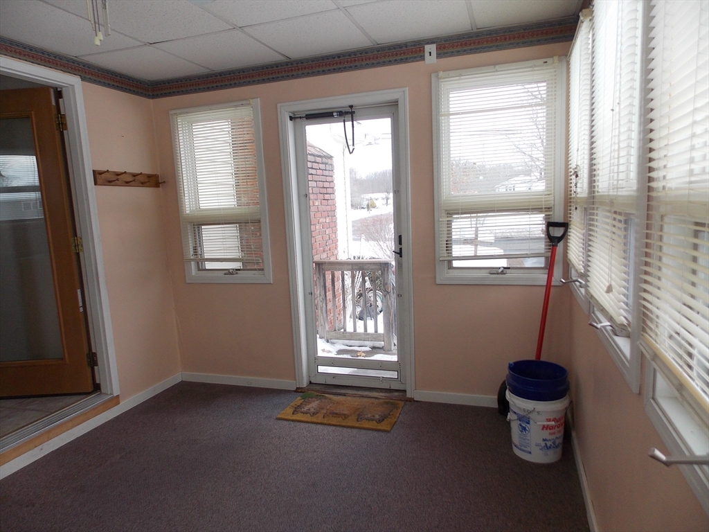 26 Old Bolton Road Hudson, MA 01749 - Photo 3 of 19 a room with hard wood flooring and a window