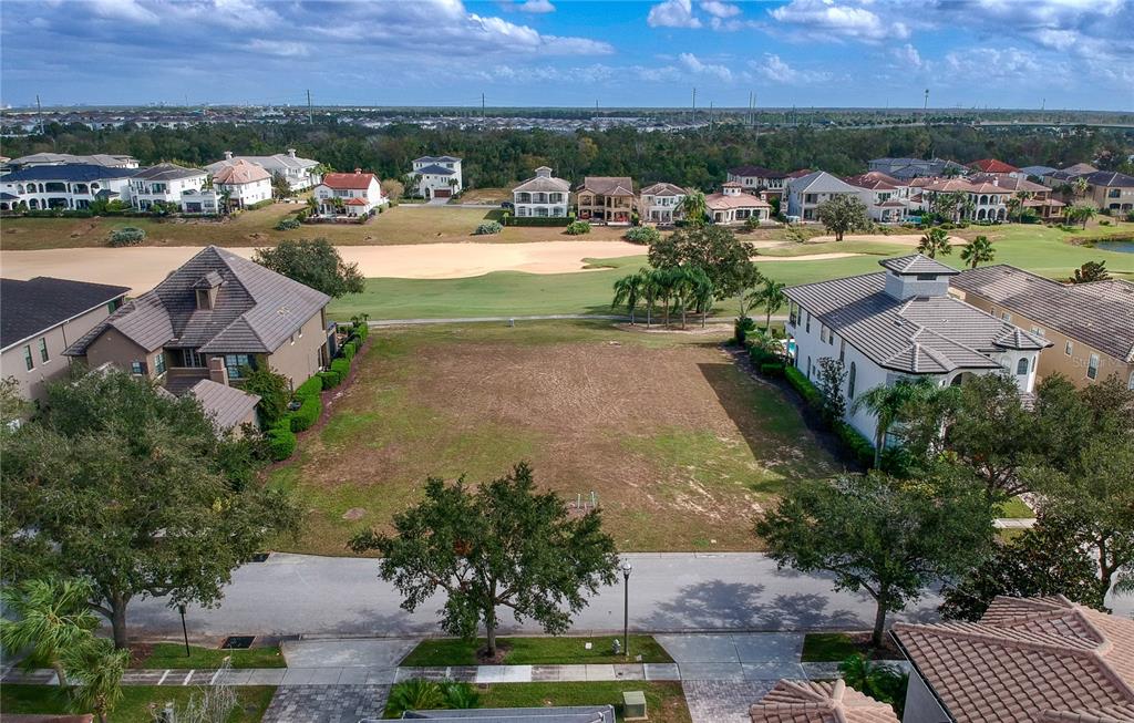 365 Muirfield Loop Reunion, FL 34747 - Photo 2 of 24 an aerial view of a houses with outdoor space