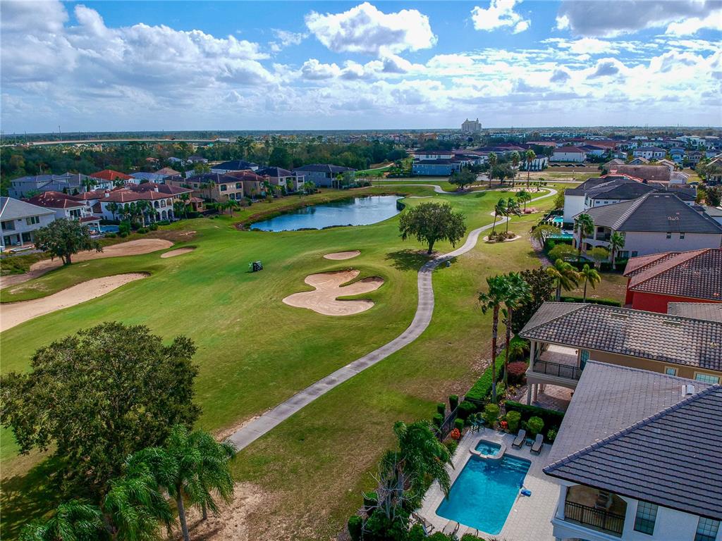 365 Muirfield Loop Reunion, FL 34747 - Photo 6 of 24 an aerial view of a residential houses with outdoor space and a lake view