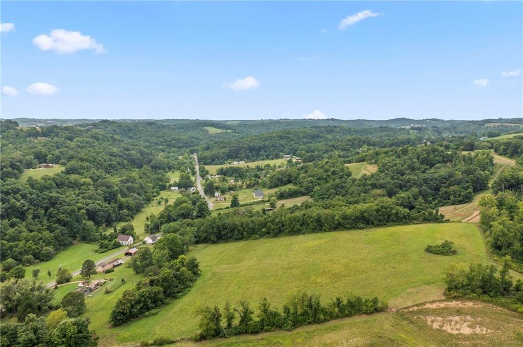652 Banetown Road Washington, PA 15301 - Photo 3 of 6 a view of a city with lush green forest
