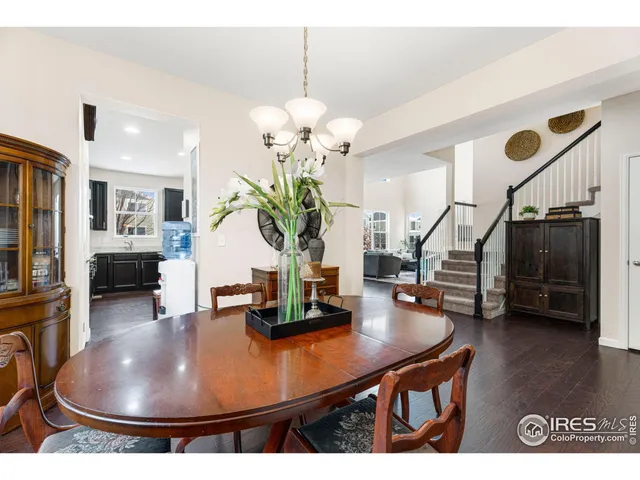 a living room with dining table