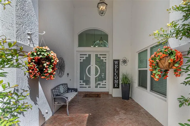a kitchen with granite countertop a sink appliances cabinets and furniture