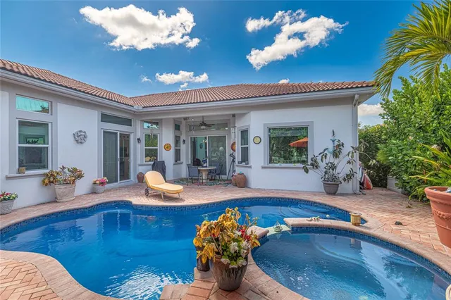a bedroom with a bed and cabinets