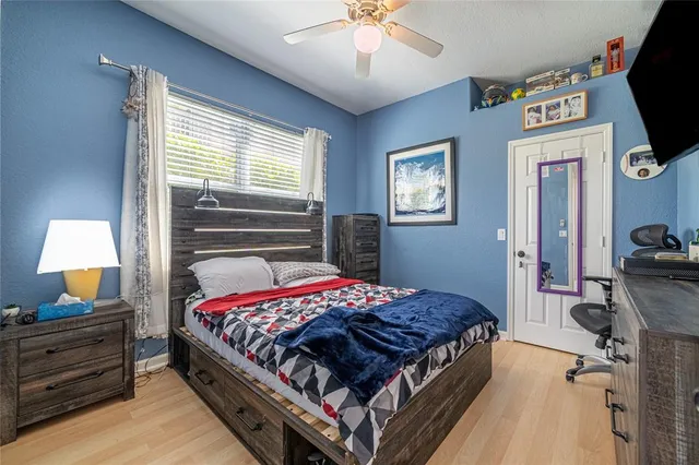 a view of a backyard with a table and chairs