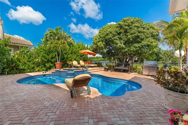 $985,000 | 12307 Northwest 49th Street, Coral Springs, FL 33076