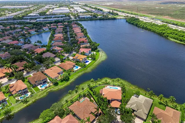 a room that has a bed and a dresser