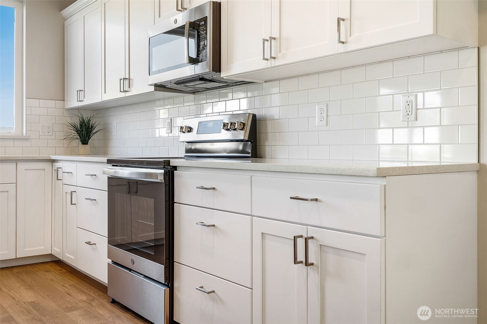 494 North Ruddy Street Moses Lake, WA 98837 - Photo 16 of 19 a kitchen with stainless steel appliances granite countertop a sink and a stove