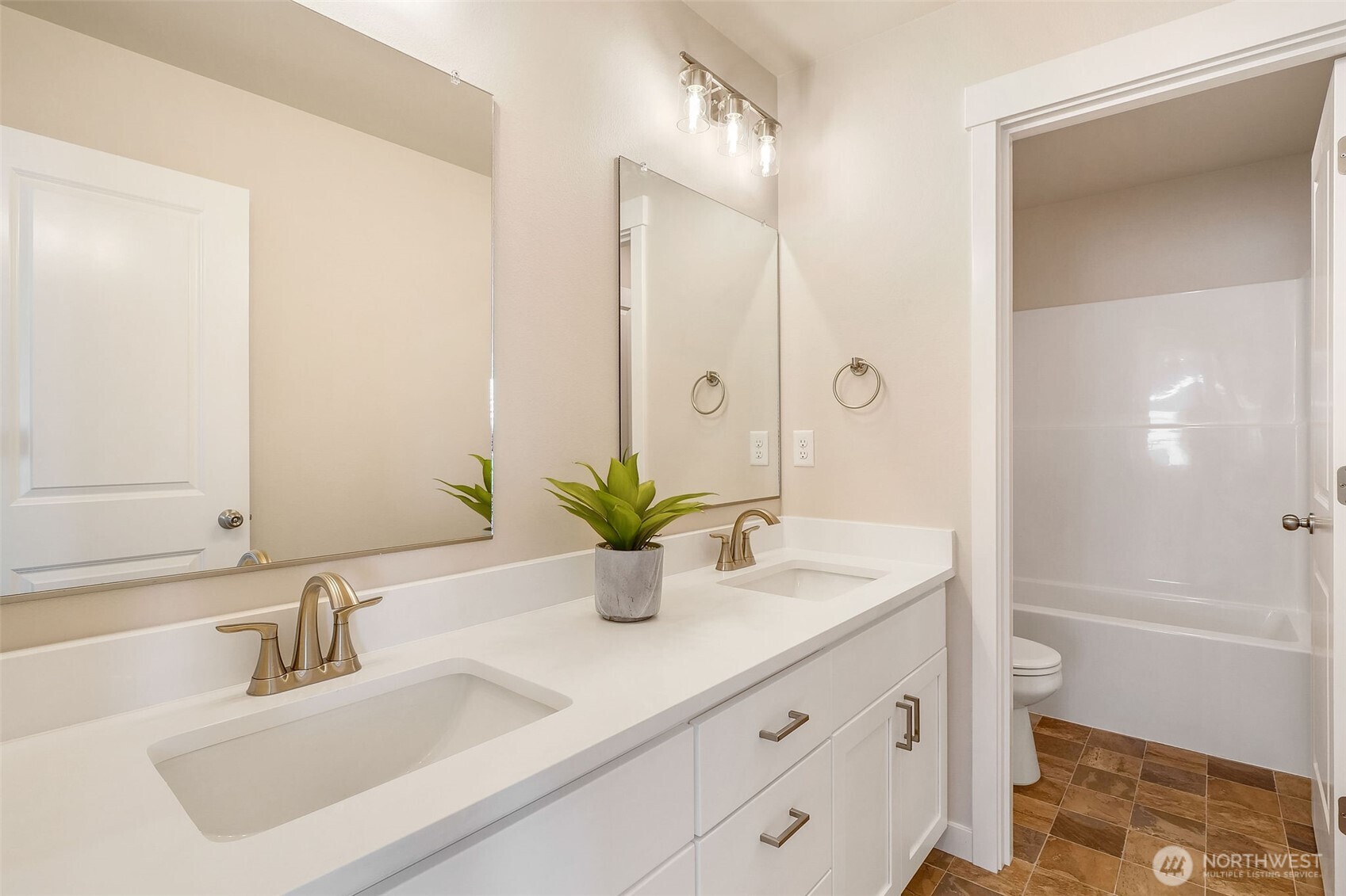 494 North Ruddy Street Moses Lake, WA 98837 - Photo 19 of 19 a bathroom with a sink and a mirror