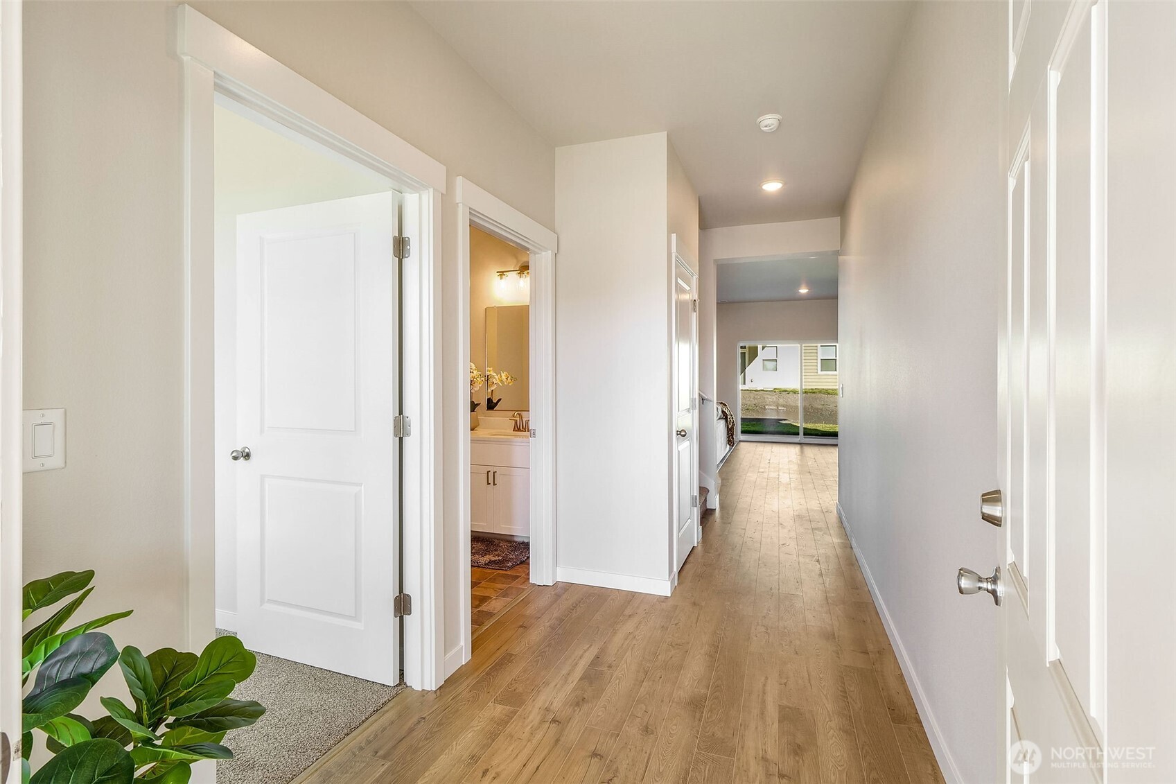 494 North Ruddy Street Moses Lake, WA 98837 - Photo 8 of 19 a view of a hallway with wooden floor