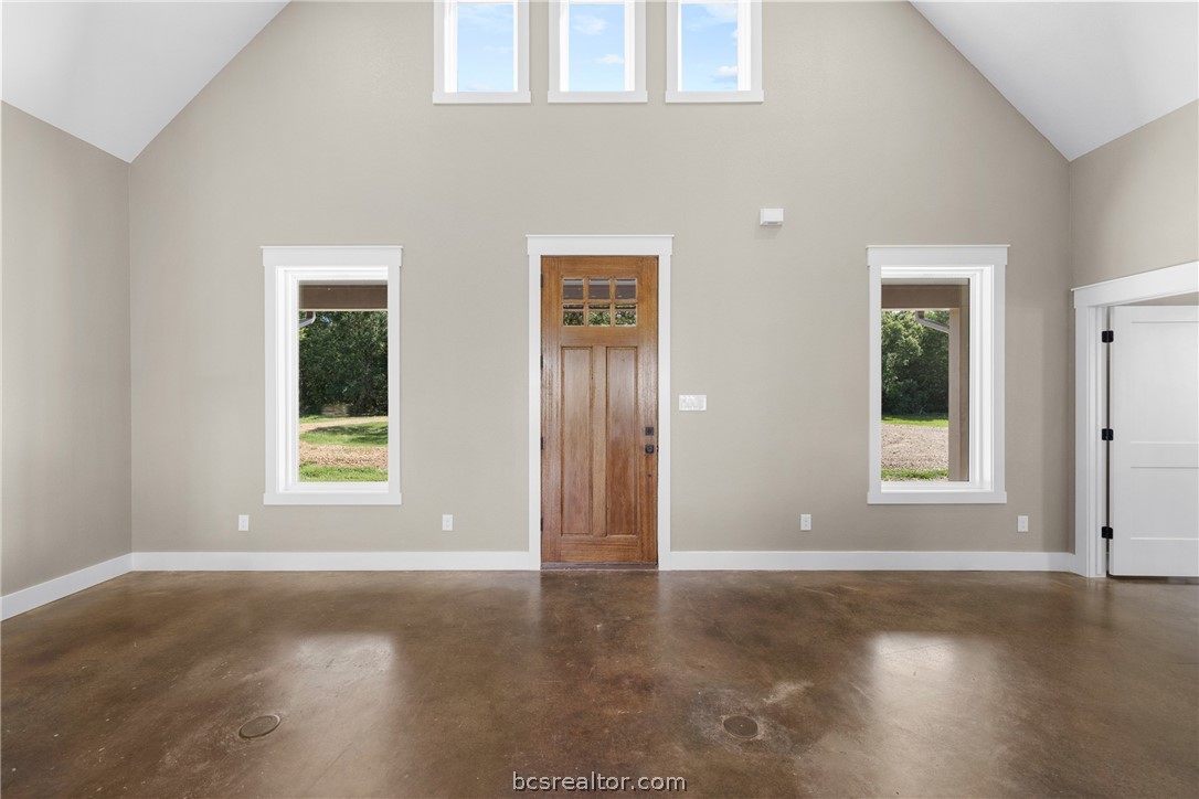 6951 Watermelon Road Somerville, TX 77879 - Photo 48 of 48 The open-concept floor plan is designed for both everyday living and entertaining, featuring soaring ceilings, abundant natural light