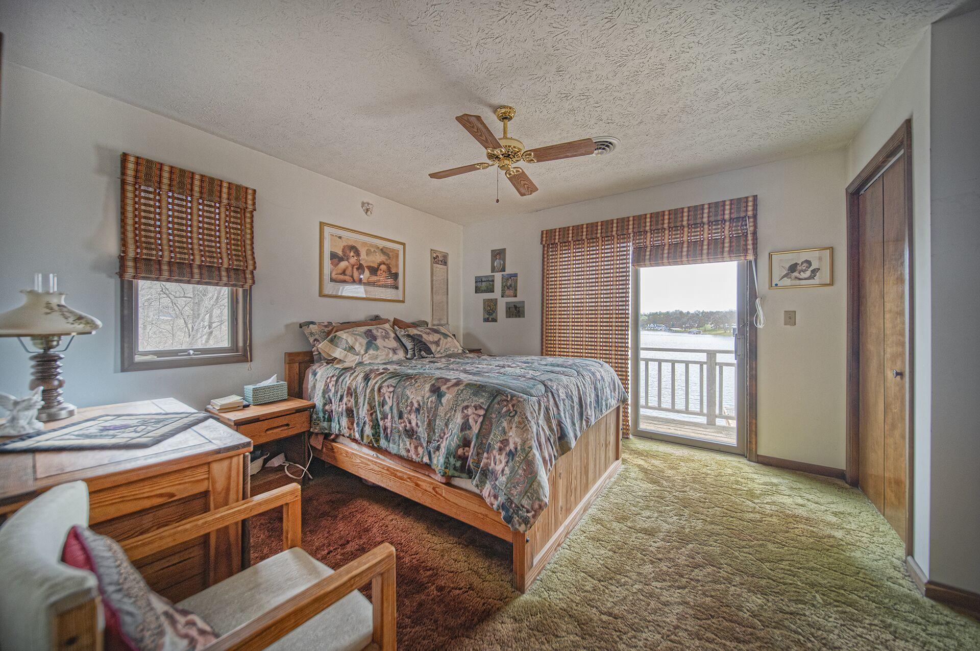 824 High Point Road Moneta, VA 24121 - Photo 14 of 18 Upper Level Bedroom w/ Lakeside Deck!