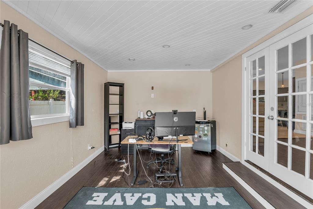 2414 Newberry Street Orlando, FL 32806 - Photo 20 of 36 a work room with furniture a rug and a window