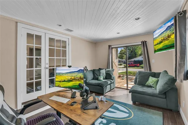 a living room with furniture and a window