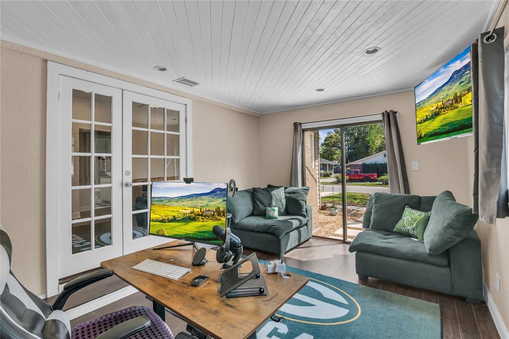 2414 Newberry Street Orlando, FL 32806 - Photo 21 of 36 a living room with furniture and a window