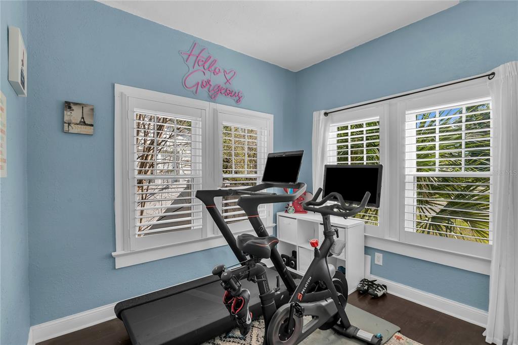 2414 Newberry Street Orlando, FL 32806 - Photo 24 of 36 a view of a workspace with furniture and a window