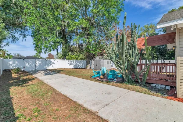 a view of a park with plants and trees