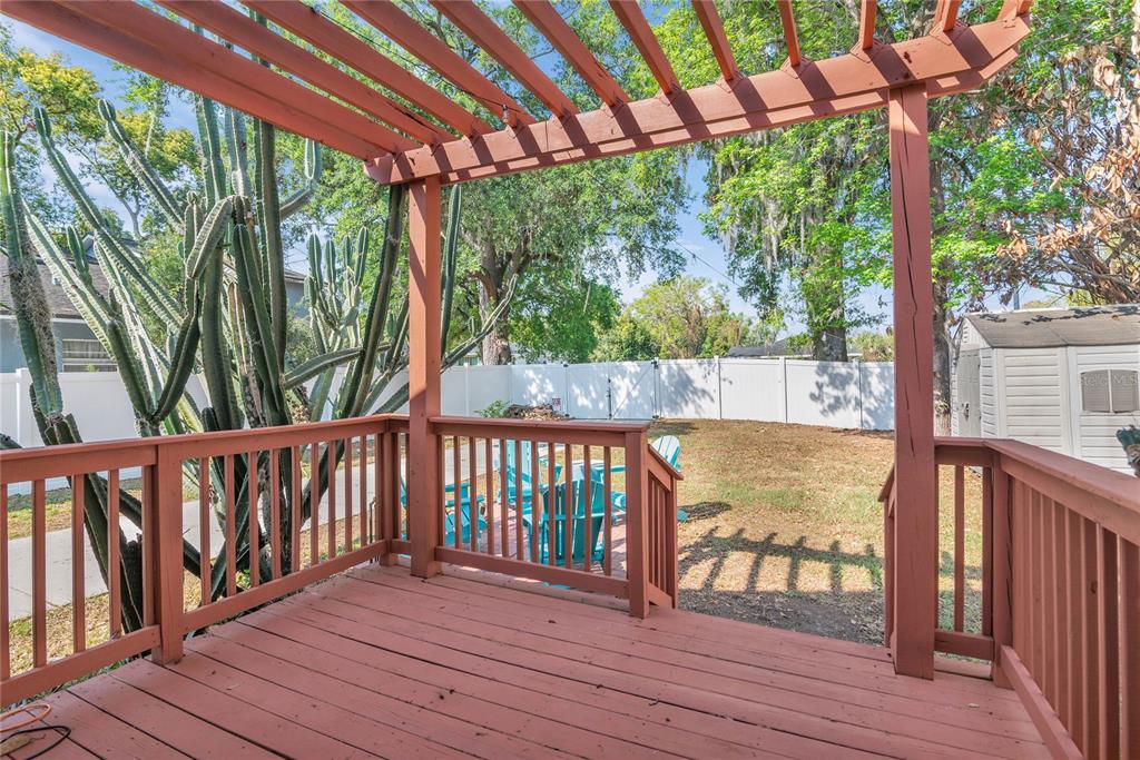 2414 Newberry Street Orlando, FL 32806 - Photo 30 of 36 a view of balcony with wooden floor
