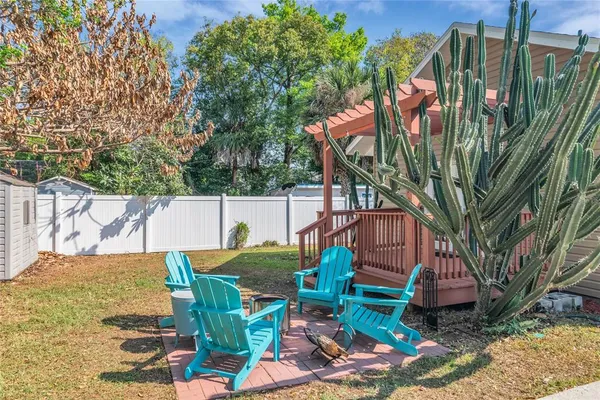 a view of a backyard with plants