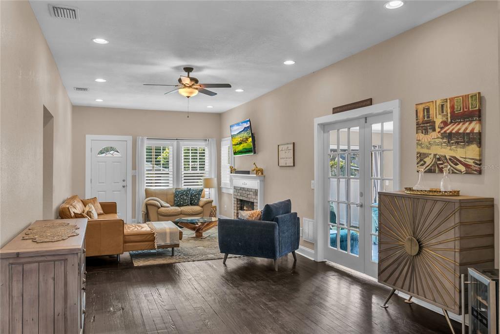 2414 Newberry Street Orlando, FL 32806 - Photo 9 of 36 a living room with furniture and wooden floor