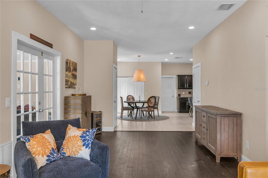 2414 Newberry Street Orlando, FL 32806 - Photo 10 of 36 a living room with fireplace furniture and a large window