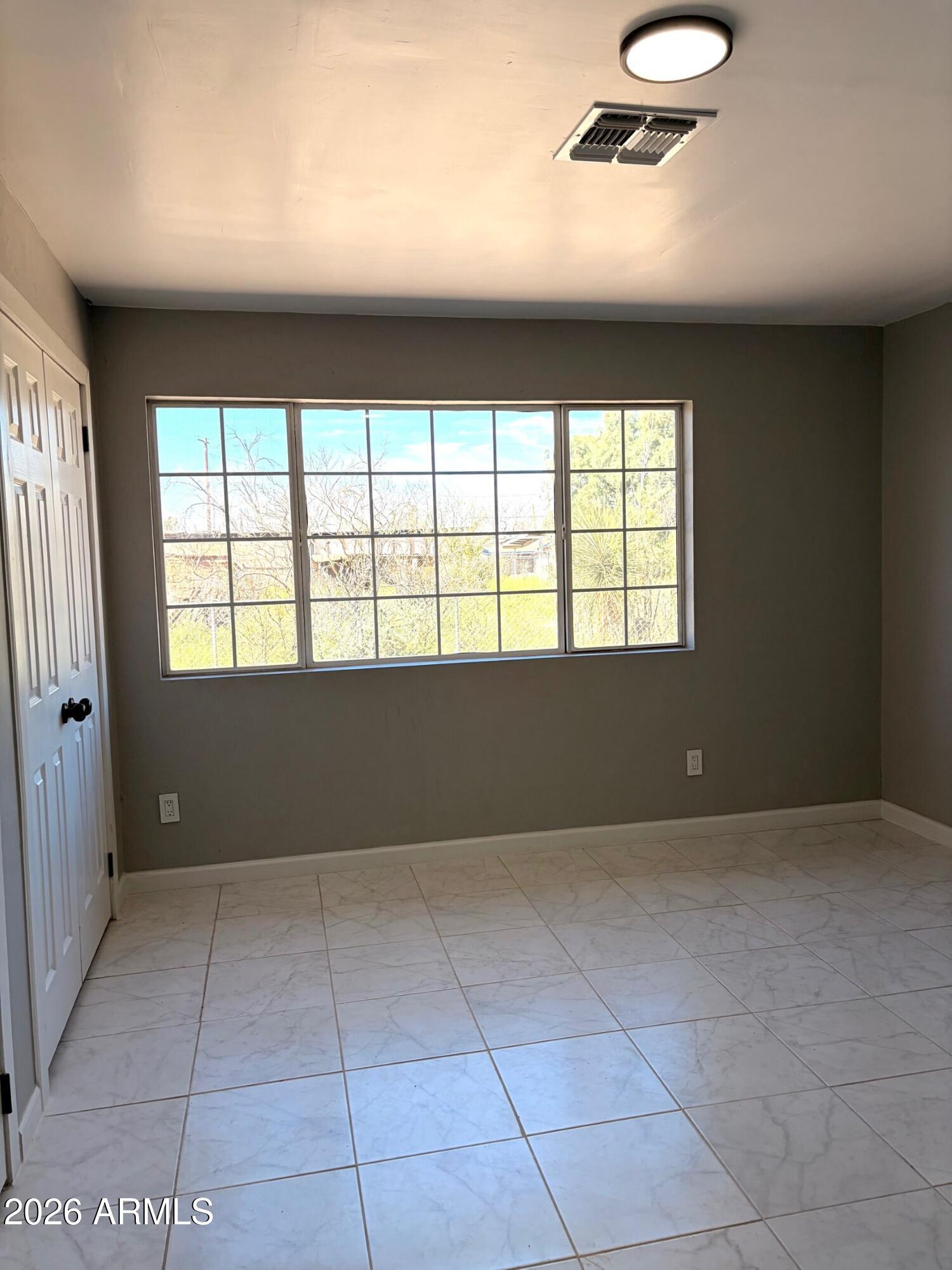 826 1st Street Douglas, AZ 85607 - Photo 20 of 35 an empty room with windows