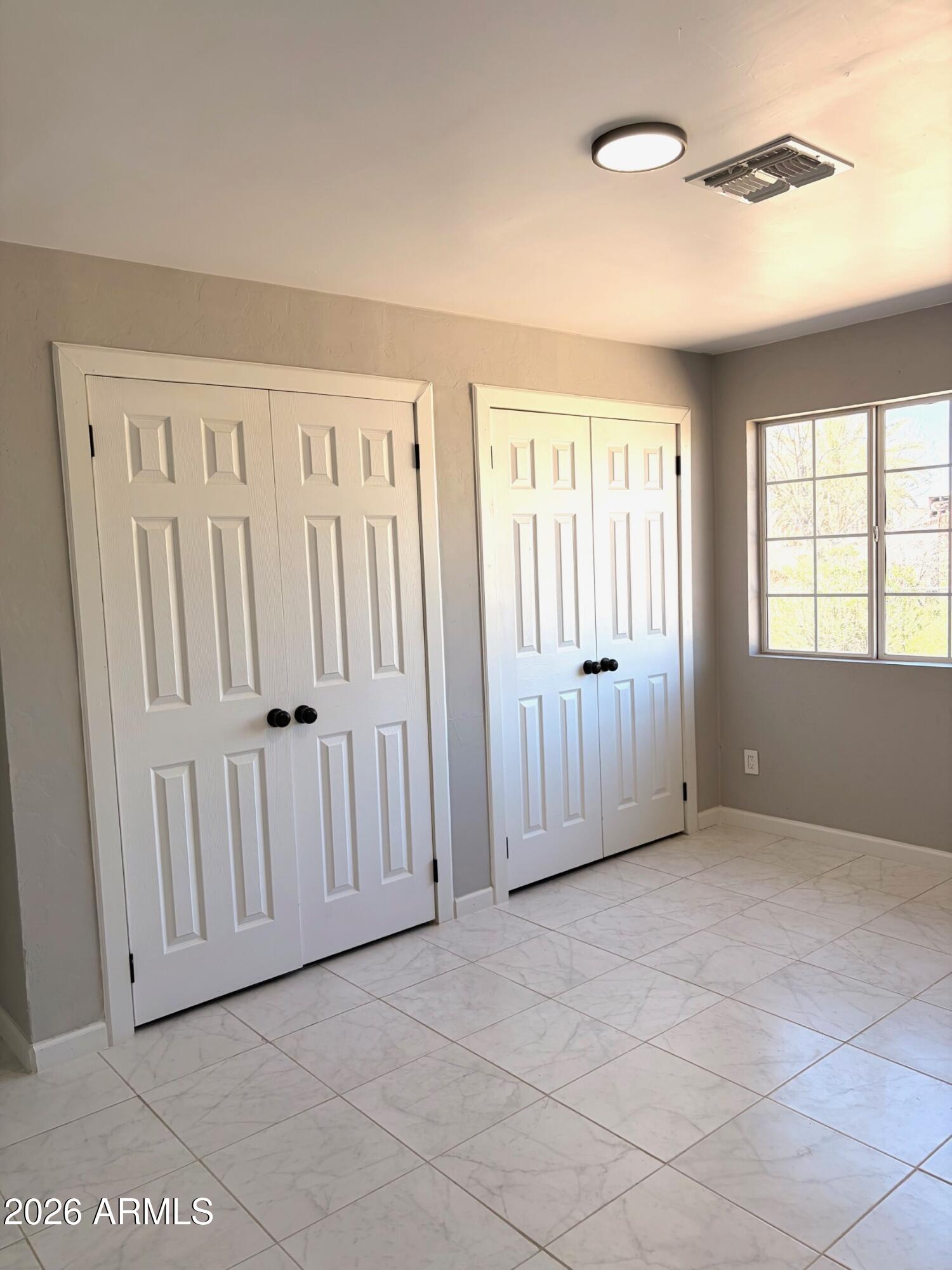 826 1st Street Douglas, AZ 85607 - Photo 28 of 35 a view of an empty room with a window