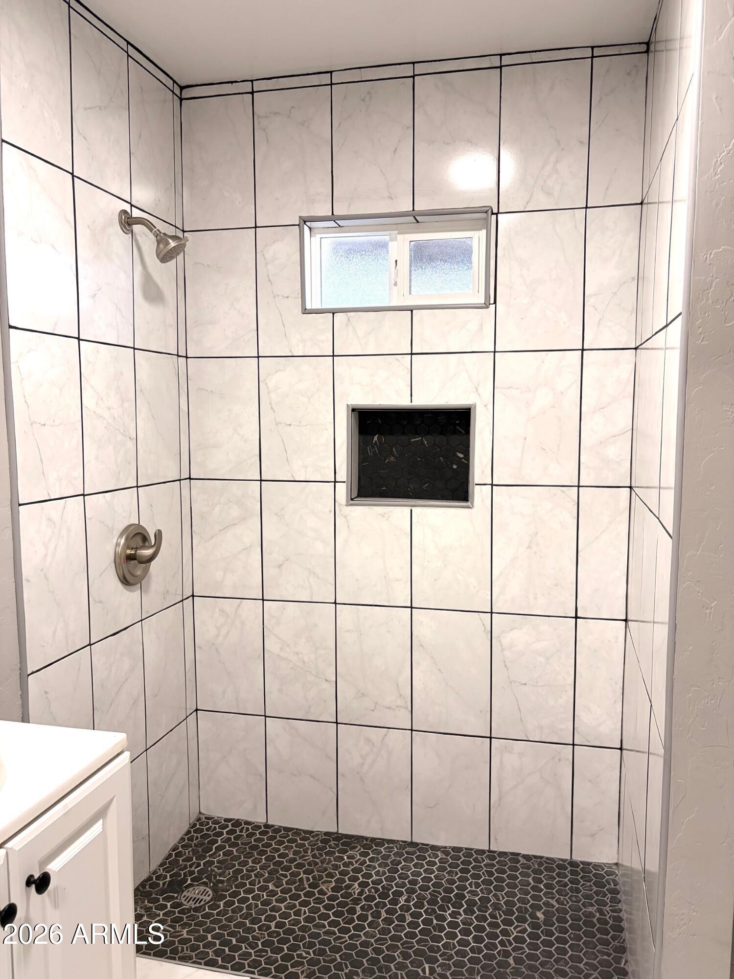 826 1st Street Douglas, AZ 85607 - Photo 30 of 35 a bathroom with a shower