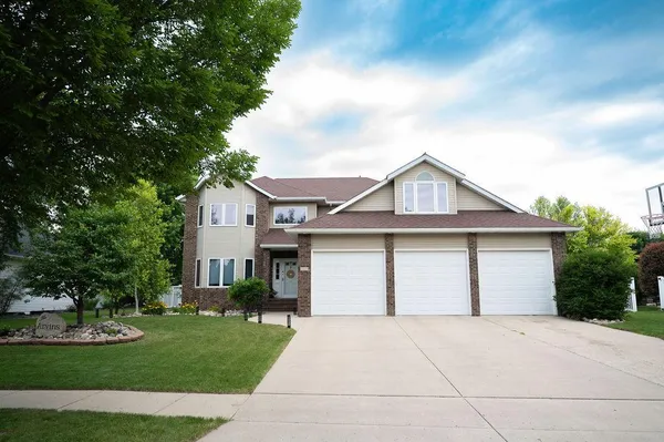 $700,000 | 2609 Meadow Creek Circle South, Fargo, ND 58104