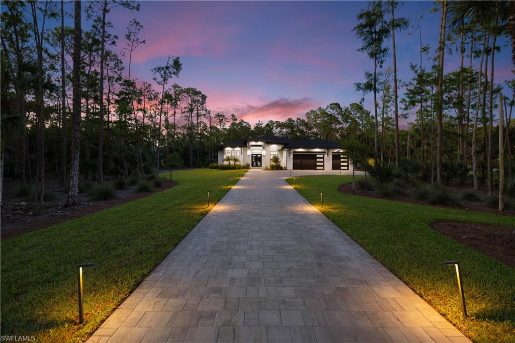 4221 7th Avenue Northwest Naples, FL 34119 - Photo 42 of 42 a view of a house with a yard