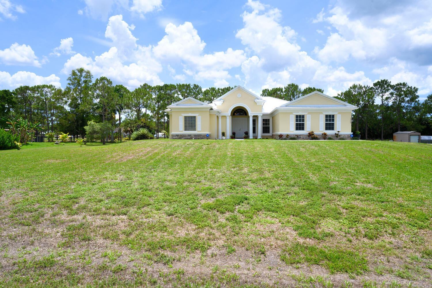17560 72nd Road North The Acreage, FL 33470 - Photo 2 of 37 17560 72nd Rd N The Acreage FL-large-002