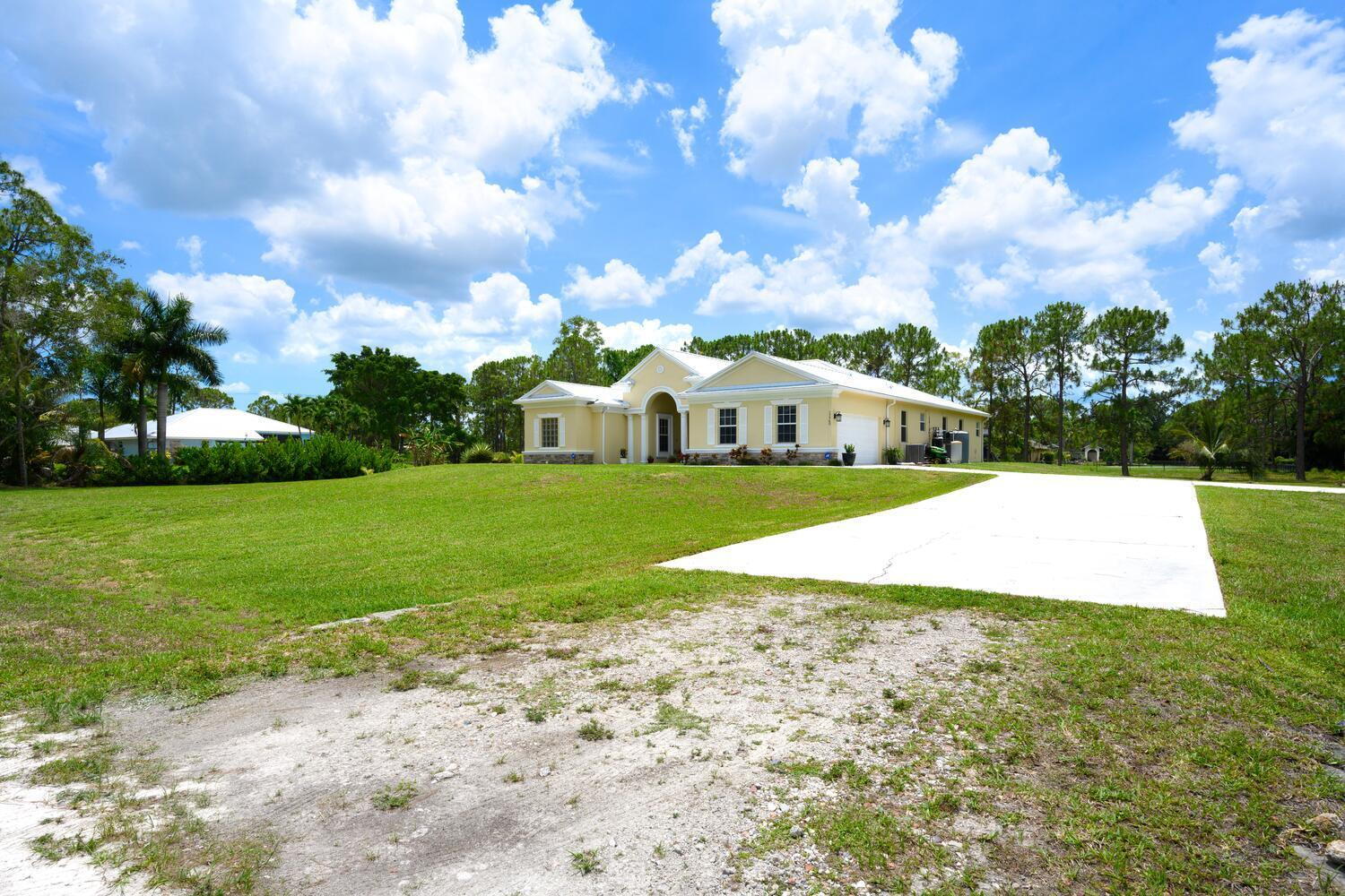 17560 72nd Road North The Acreage, FL 33470 - Photo 3 of 37 17560 72nd Rd N The Acreage FL-large-003