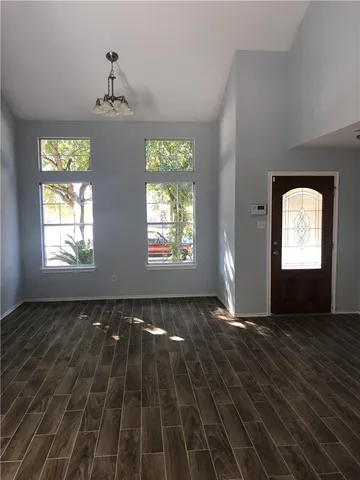 a view of an empty room and window