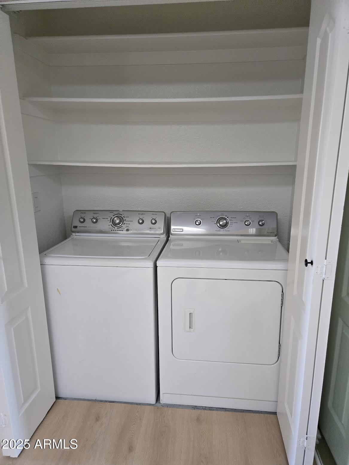 97 North Cooper Road, Unit 86 Chandler, AZ 85225 - Photo 16 of 16 a utility room with dryer and washer