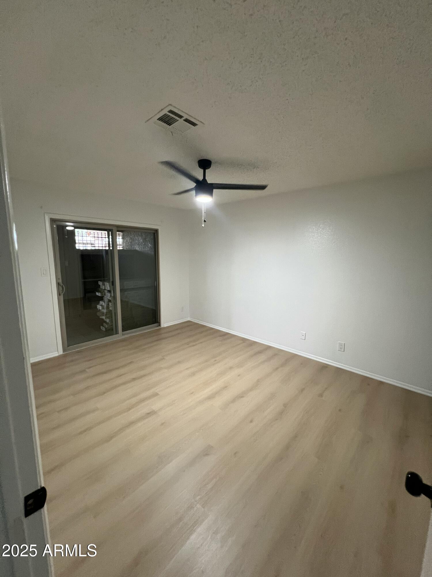 97 North Cooper Road, Unit 86 Chandler, AZ 85225 - Photo 6 of 16 a view of an empty room