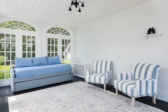 a living room with large windows