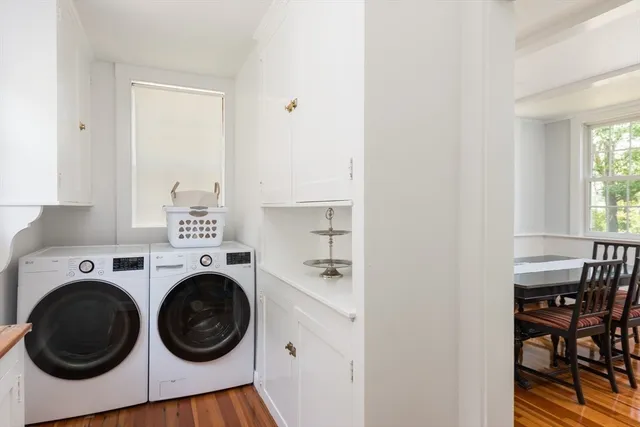 a kitchen with a sink a stove and cabinets