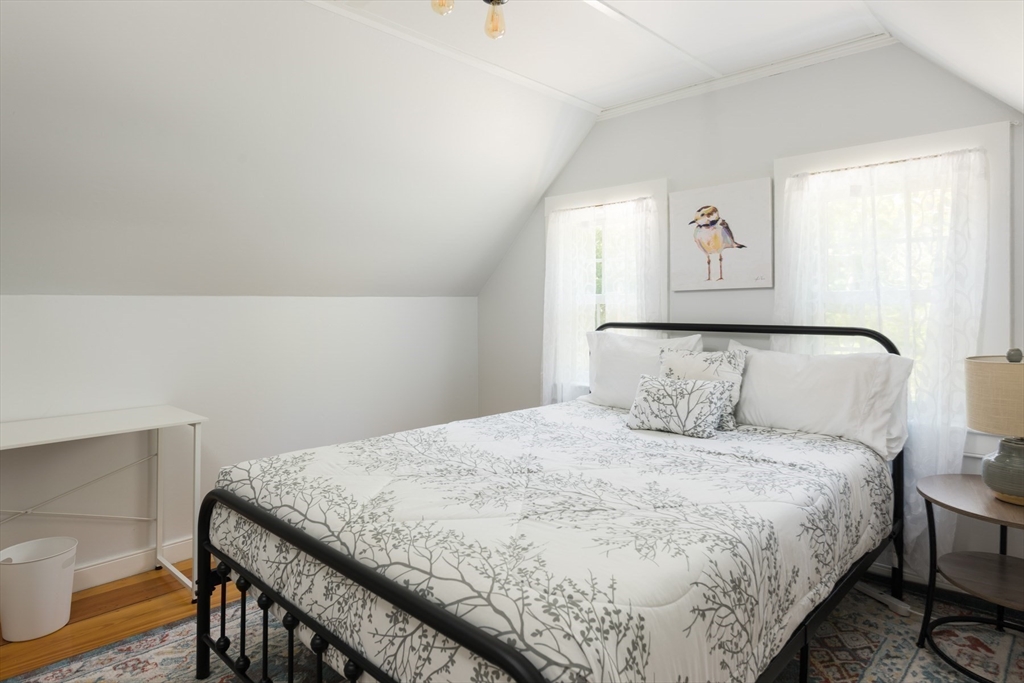 16 Jefferson Shores Road Wareham, MA 02532 - Photo 25 of 35 a bedroom with a bed and a window