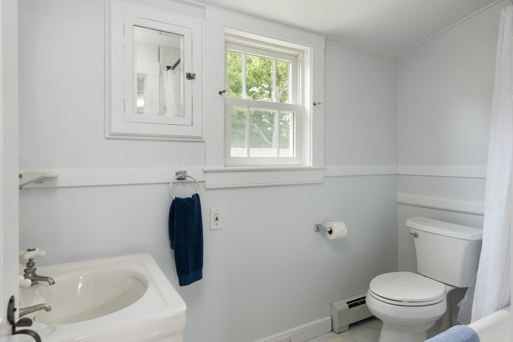 16 Jefferson Shores Road Wareham, MA 02532 - Photo 30 of 35 a bathroom with a toilet and a sink