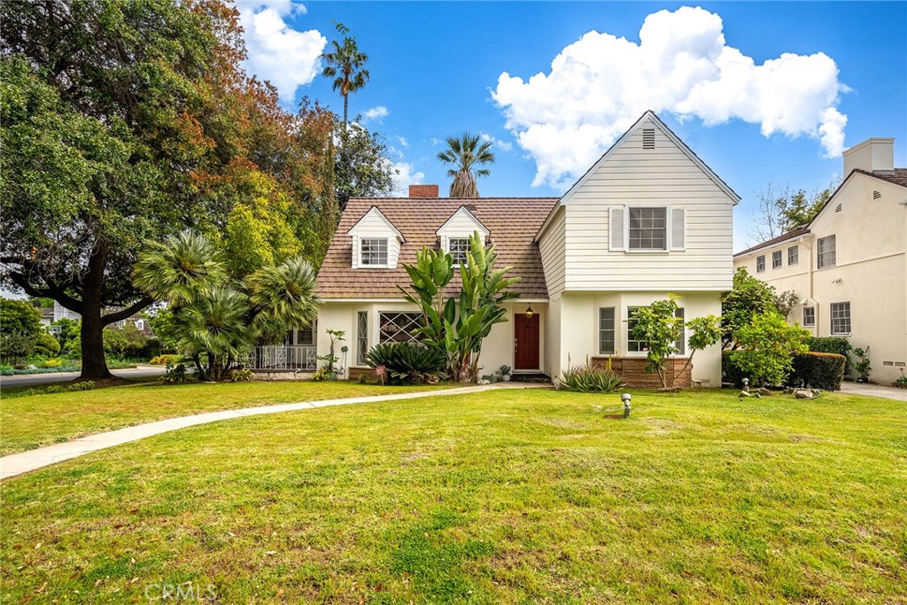 2390 Roanoke Road San Marino, CA 91108 - Photo 1 of 1 a view of a house with swimming pool and a yard
