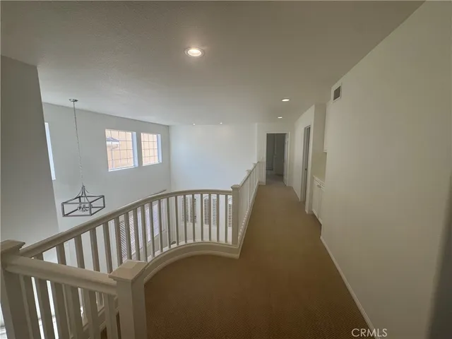 a view of hallway with stairs