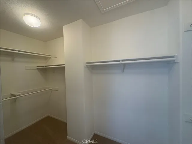 a view of an empty walk in closet