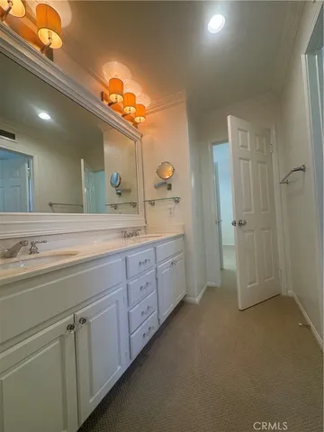 a bathroom with a toilet and bathtub