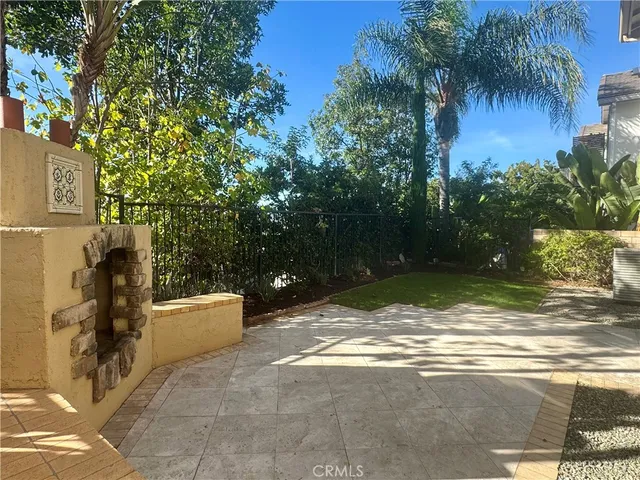 a view of a yard with palm tree
