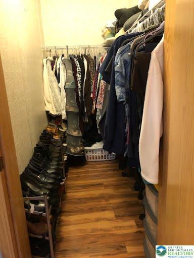 4905 Cedar Grove Road Bangor, PA 18013 - Photo 28 of 50 a view of walk in closet with clothes and shoes