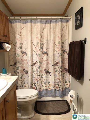 4905 Cedar Grove Road Bangor, PA 18013 - Photo 41 of 50 a bathroom with a toilet and a shower curtain