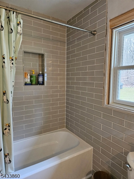 106 Lake Wallkill Road Vernon, NJ 07461 - Photo 12 of 24 a bathroom with a shower and a bath tub