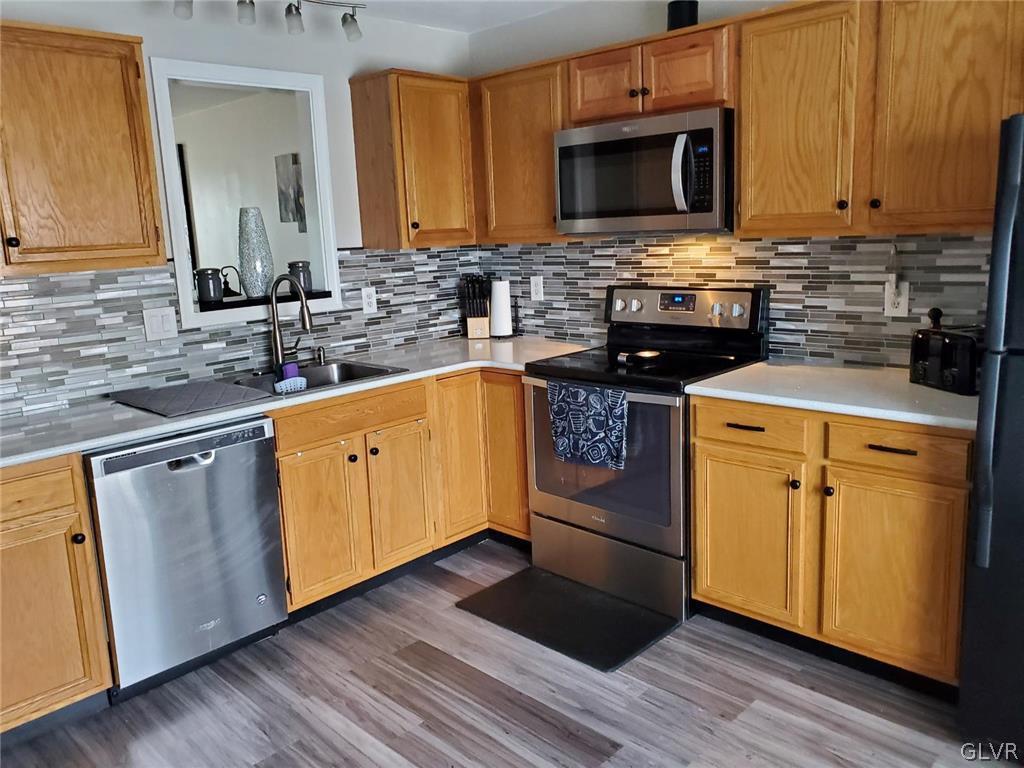 40 Corriere Road Easton, PA 18045 - Photo 17 of 44 a kitchen with a sink stove and microwave